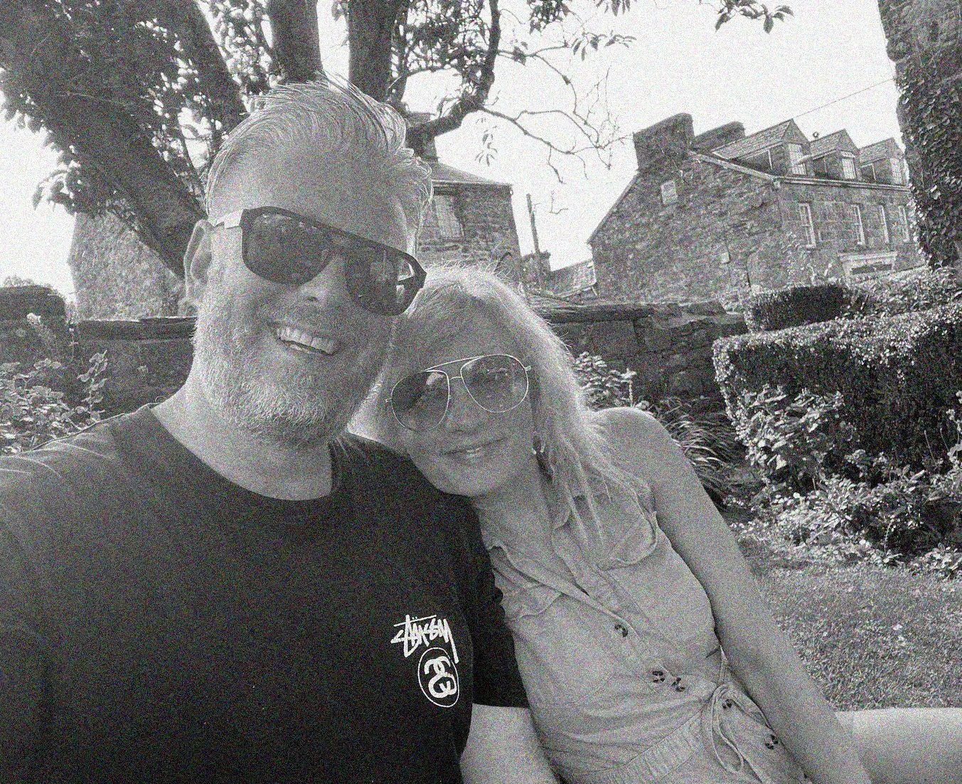 Gav and Monika, the two people behind Graft, smiling outdoors